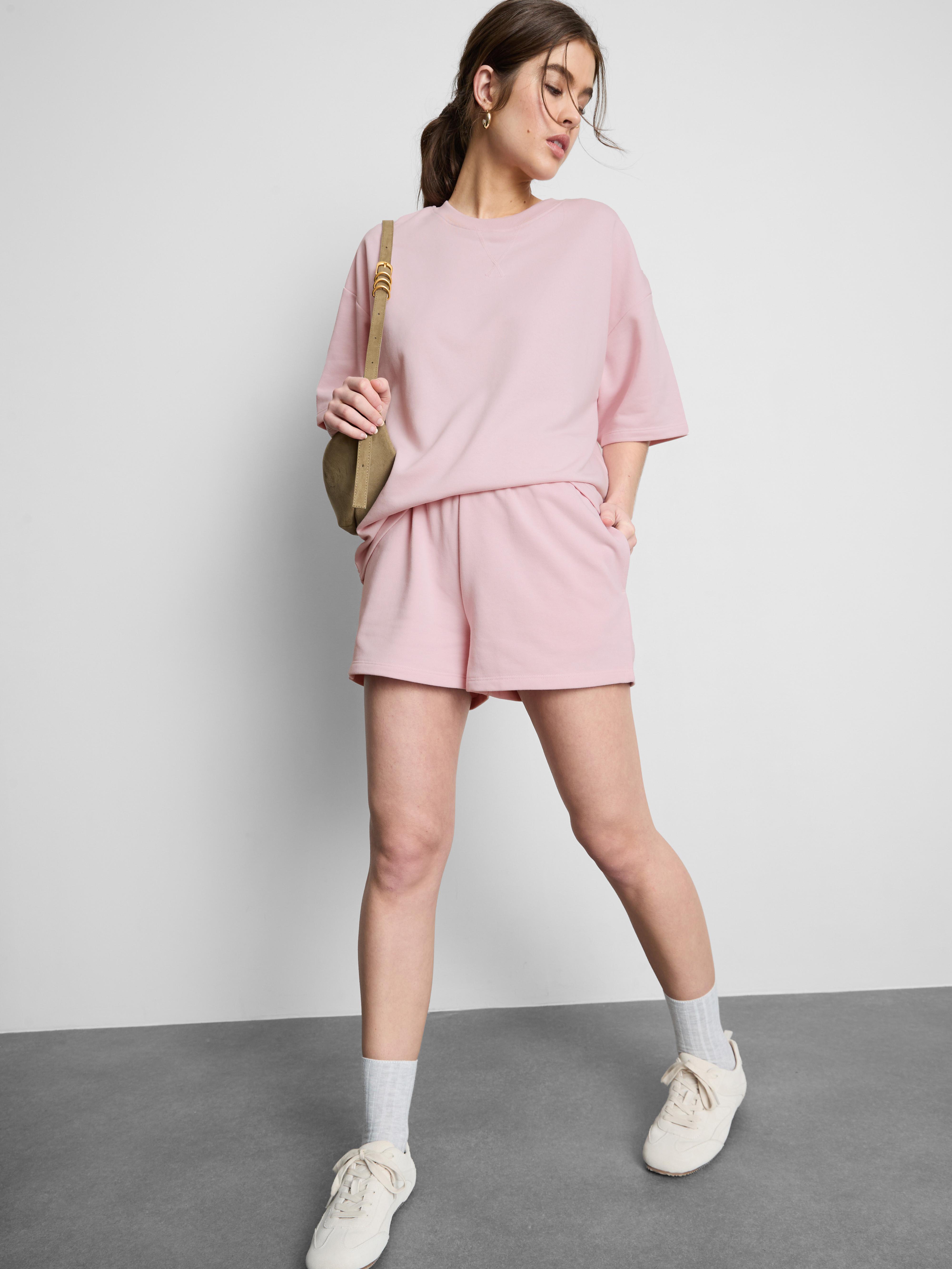 Cotton Rich Relaxed Airport Shorts — Light Pink